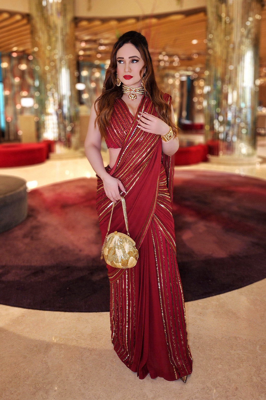 Stephanie Timmings in Red draped hand-embroidered sari with V-neck Blouse from our Caged Kaleidoscope Ethnic collection