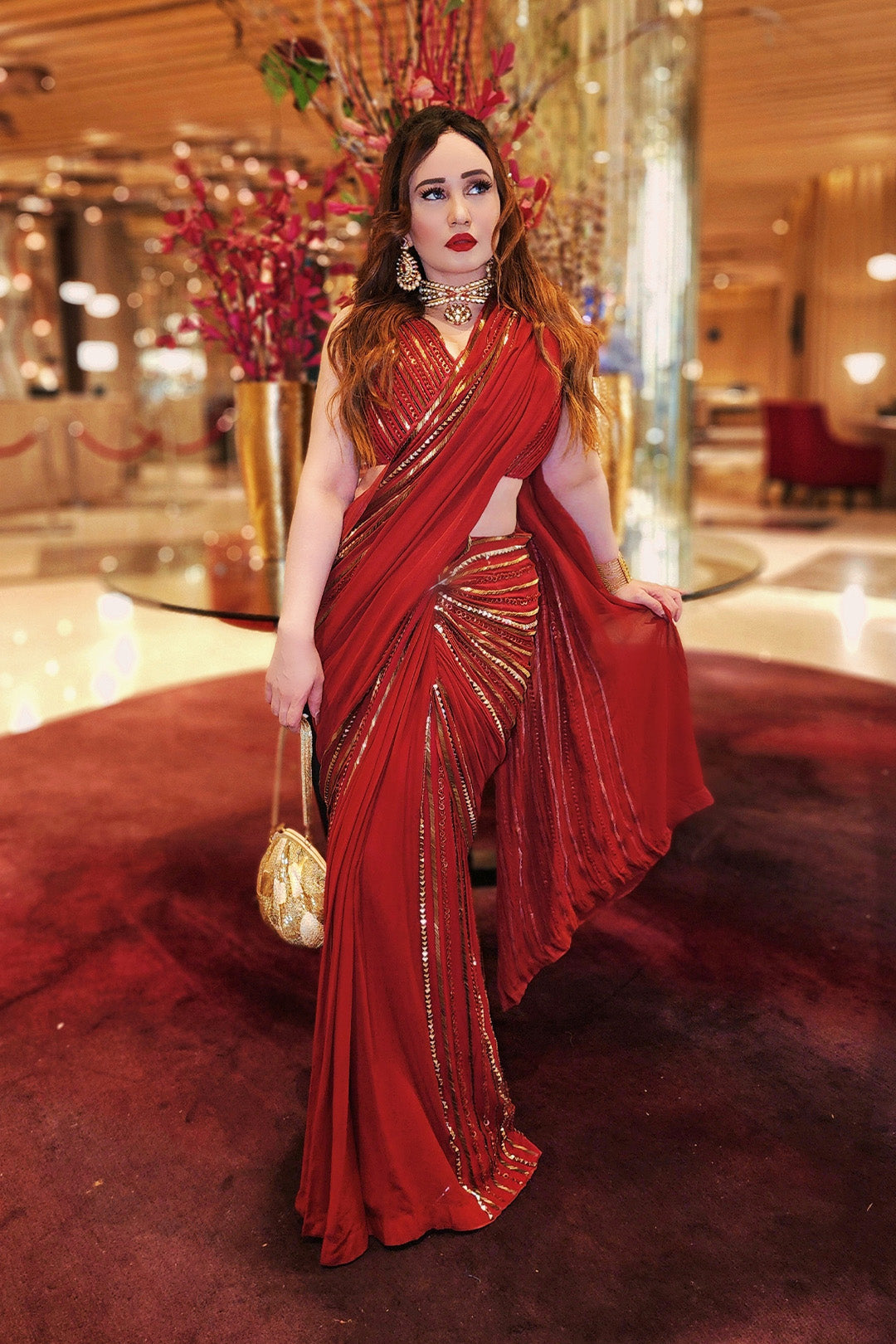 Stephanie Timmings in Red draped hand-embroidered sari with V-neck Blouse from our Caged Kaleidoscope Ethnic collection