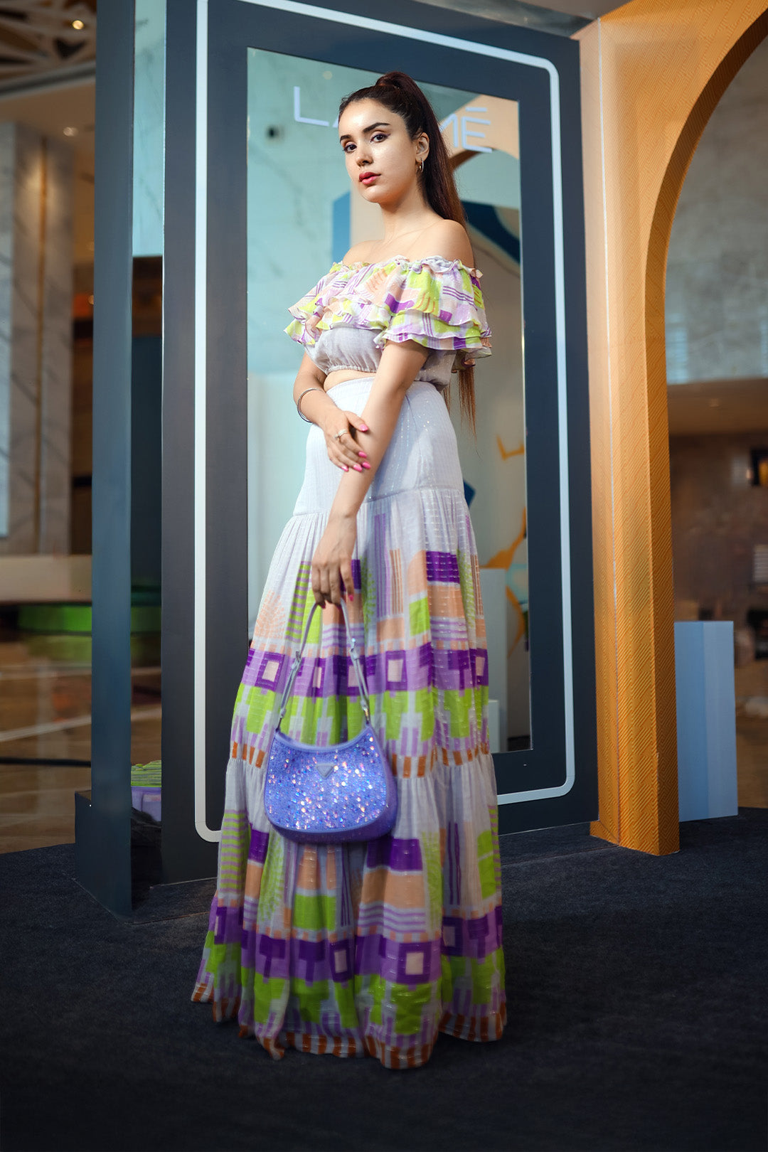 Jasleen Sabrawal in Geometric Printed Off Shoulder Crop Top and Printed Skirt from Magical Wilderness Collection