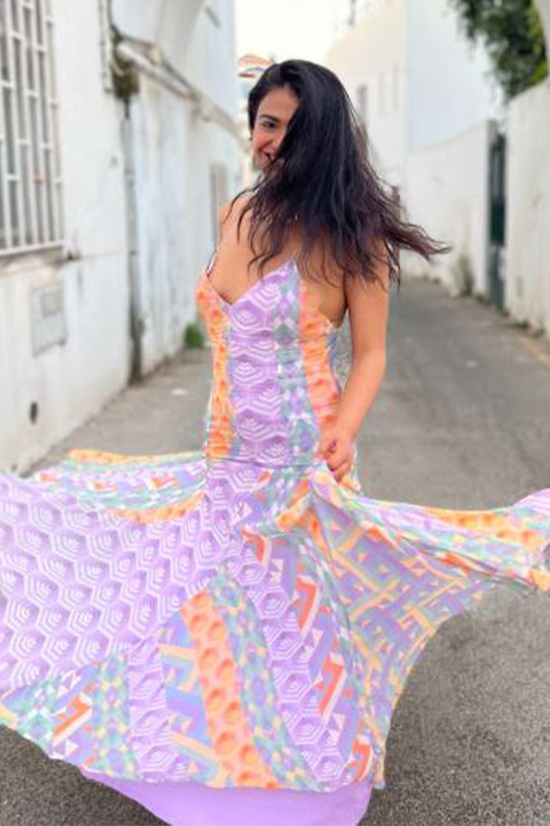 Nishtha gandhi in Nirmooha's Flared Printed Panel Cami Dress from Retro-Spection Collection