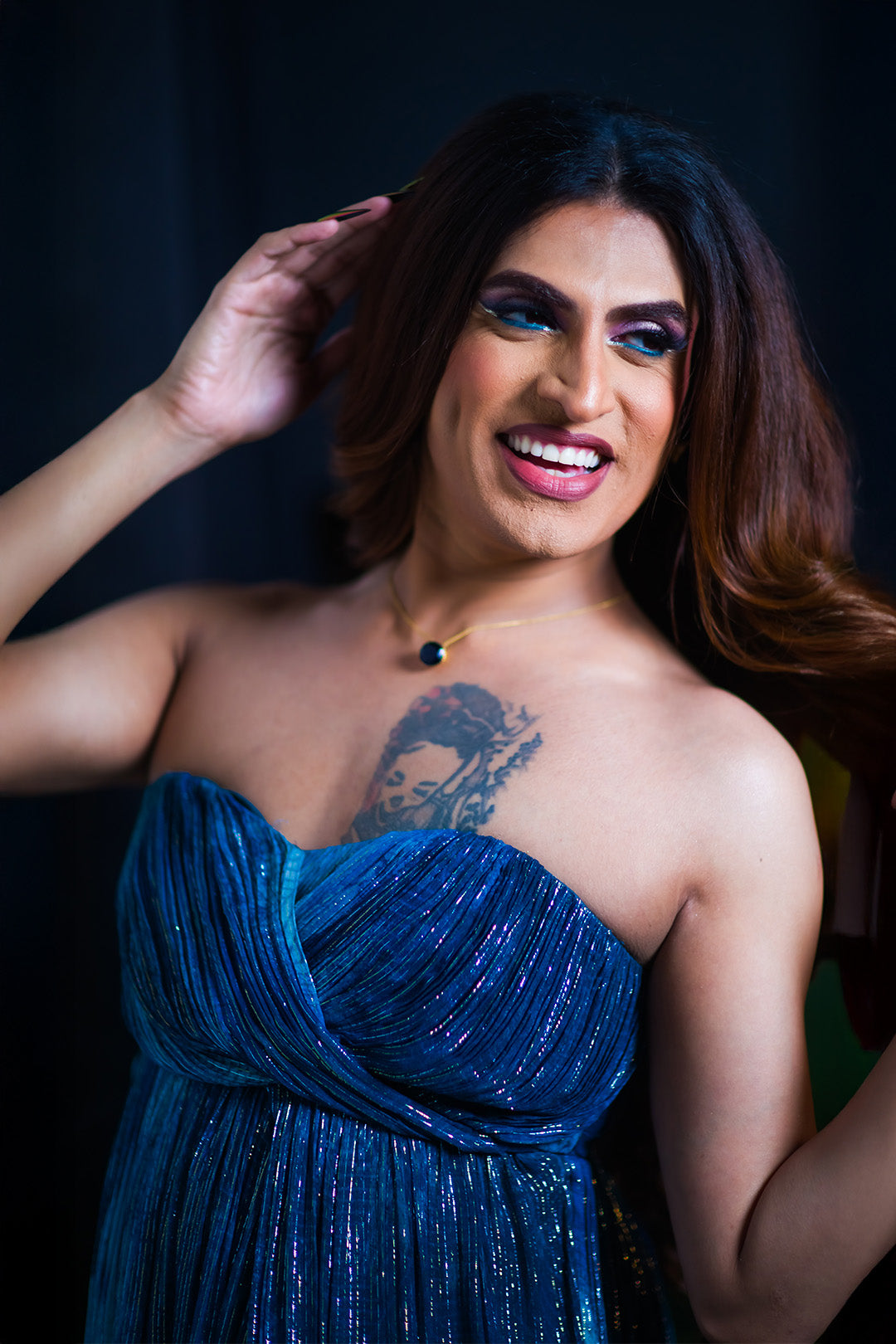 Shushant in our Jade Blue Printed Drape Gown With Sweet Heart Neck & Slit From Matrix Collection