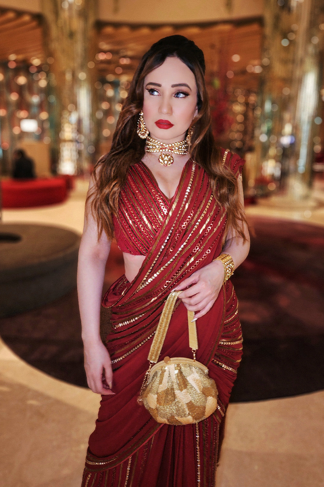 Stephanie Timmings in Red draped hand-embroidered sari with V-neck Blouse from our Caged Kaleidoscope Ethnic collection