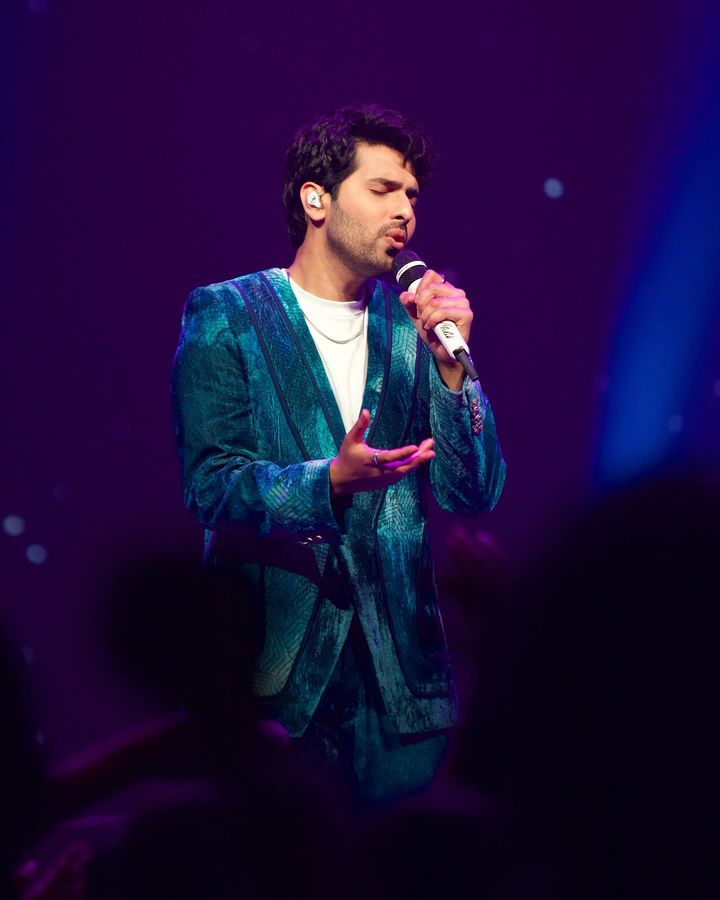 Armaan Malik in our Jade Blue Blotched Print Velvet Blazer Set from Matrix