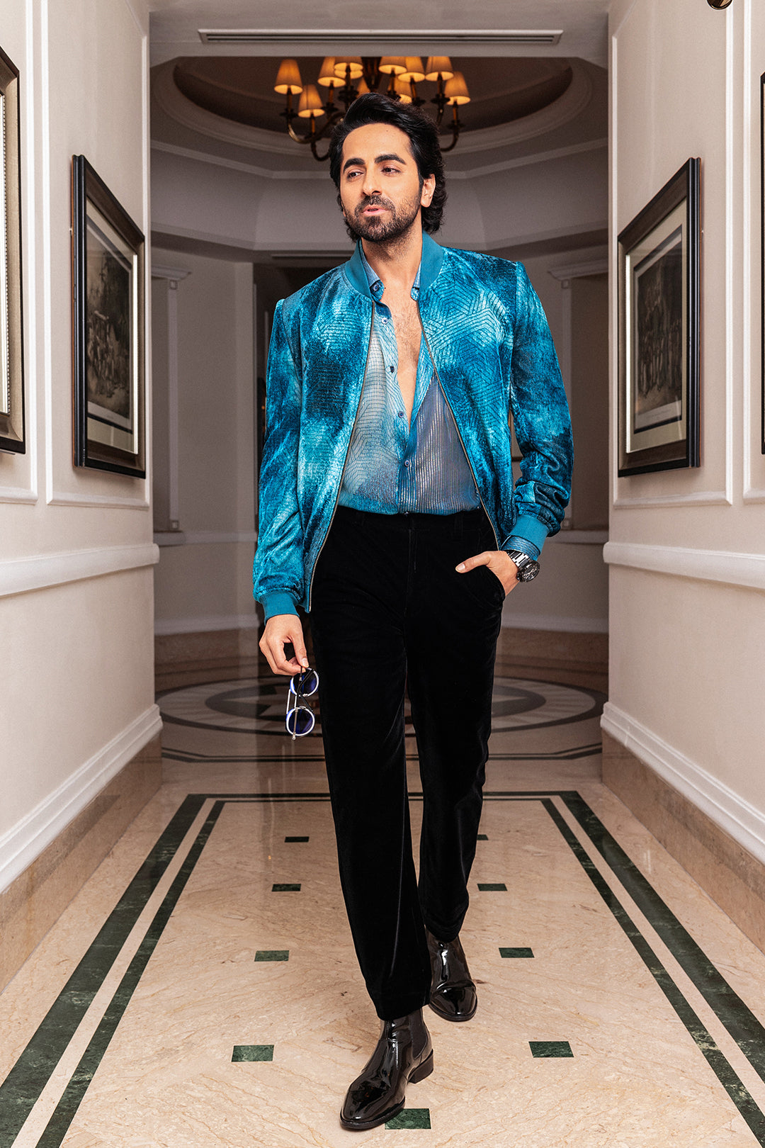 Ayushmann Khurrana in Our Jade Blue Printed Sheer Lurex Shirt and Jade Blue Printed Velvet Bomber Jacket from Matrix