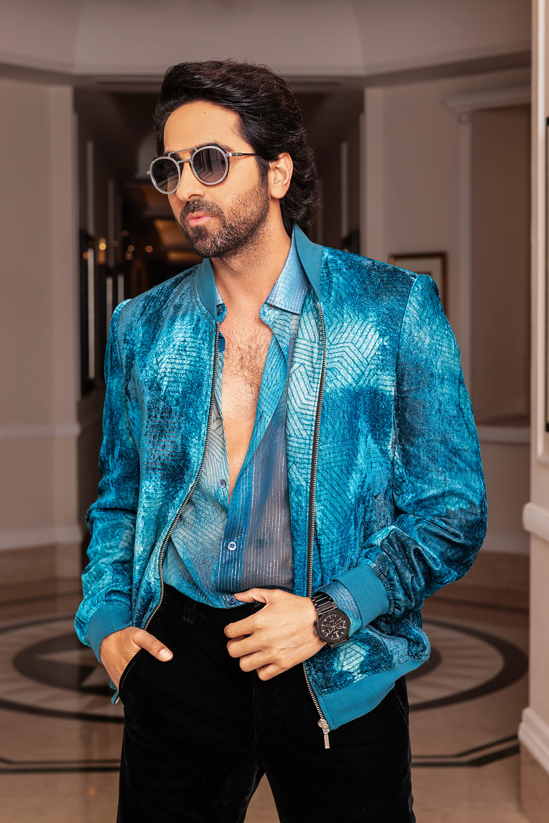 Ayushmann Khurrana in Our Jade Blue Printed Sheer Lurex Shirt and Jade Blue Printed Velvet Bomber Jacket from Matrix