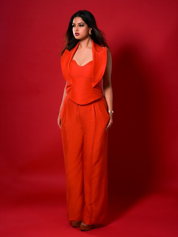 Harnaaz Sindhu in our Vermillion Halter Neck Corset Top with Lapel and Collar detailing Paired with Wide leg Pleated Pants from our Aham Asim Collection