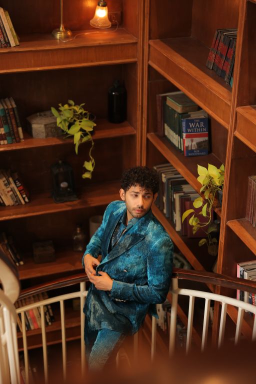 Varun Agrawal in our Jade Blue Blotched Print Blazer, Jade Blue Blotched Print Velvet Pants and Jade Blue Lurex Blotch Printed Shirt with Lining from Matrix Collection