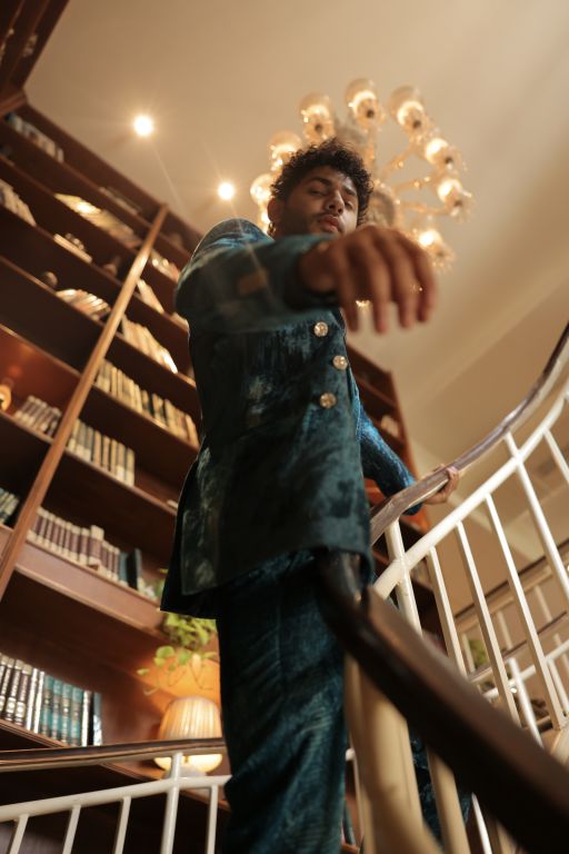 Varun Agrawal in our Jade Blue Blotched Print Blazer, Jade Blue Blotched Print Velvet Pants and Jade Blue Lurex Blotch Printed Shirt with Lining from Matrix Collection