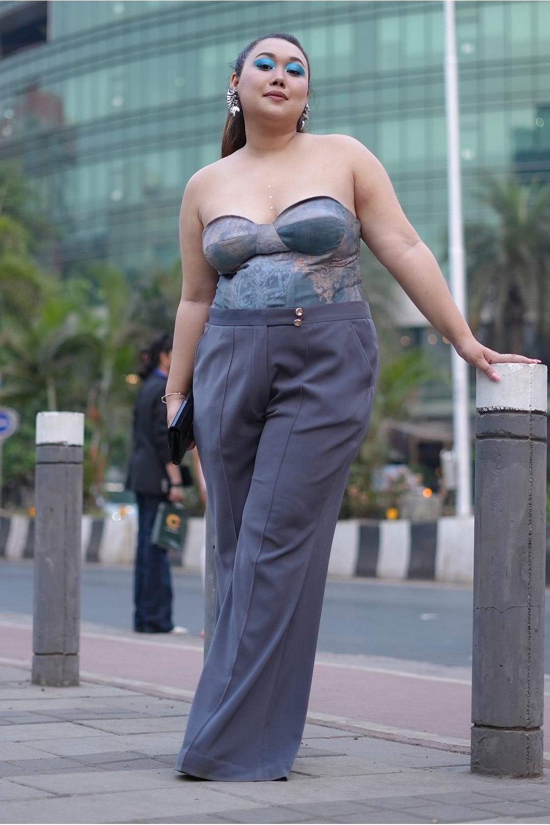 Shraddha Guran in our Printed Chiffon Bodysuit paired with Grey Micro Flared Pants from Ancienne Collection