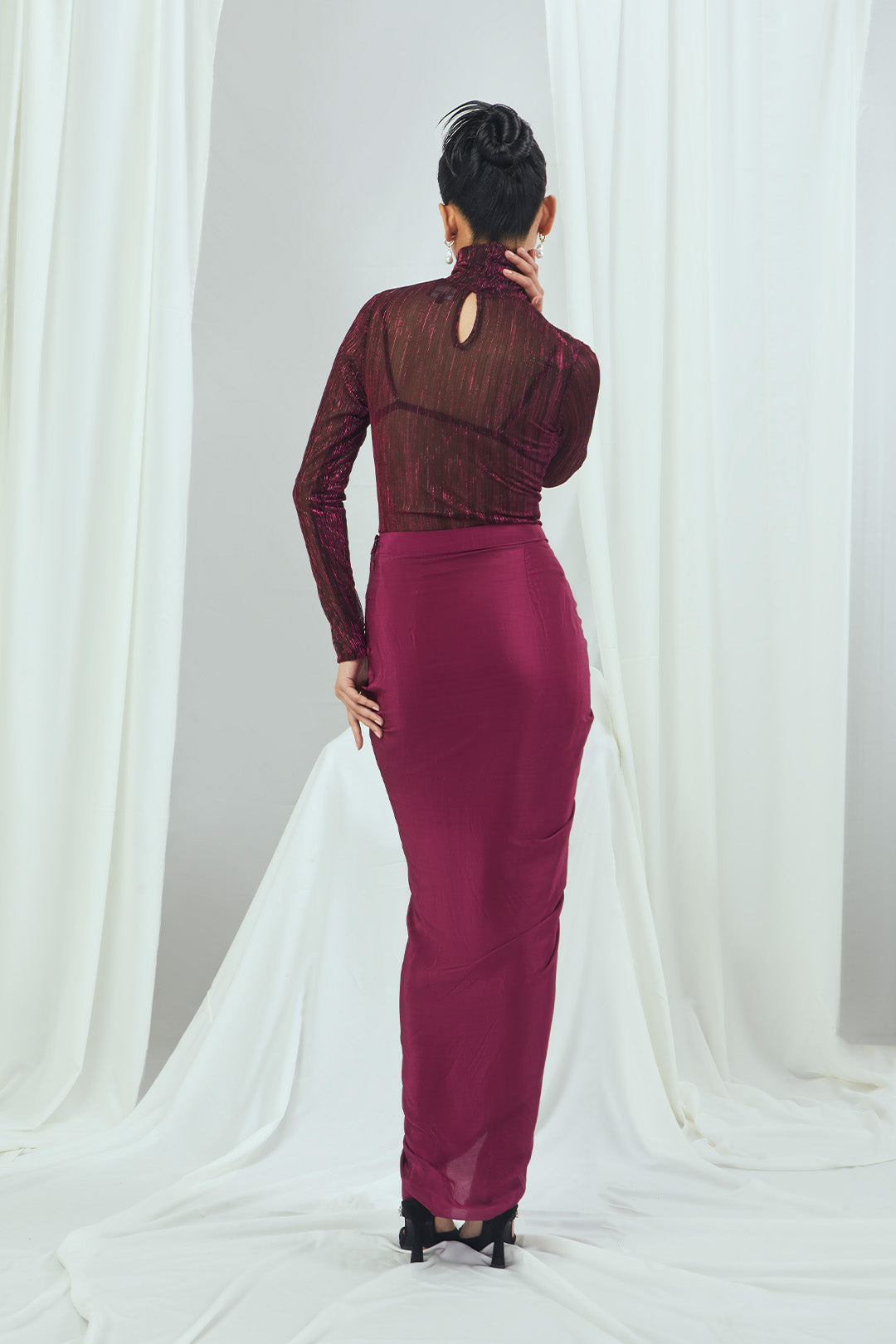 Metallic turtle neck bodysuit with draped skirt