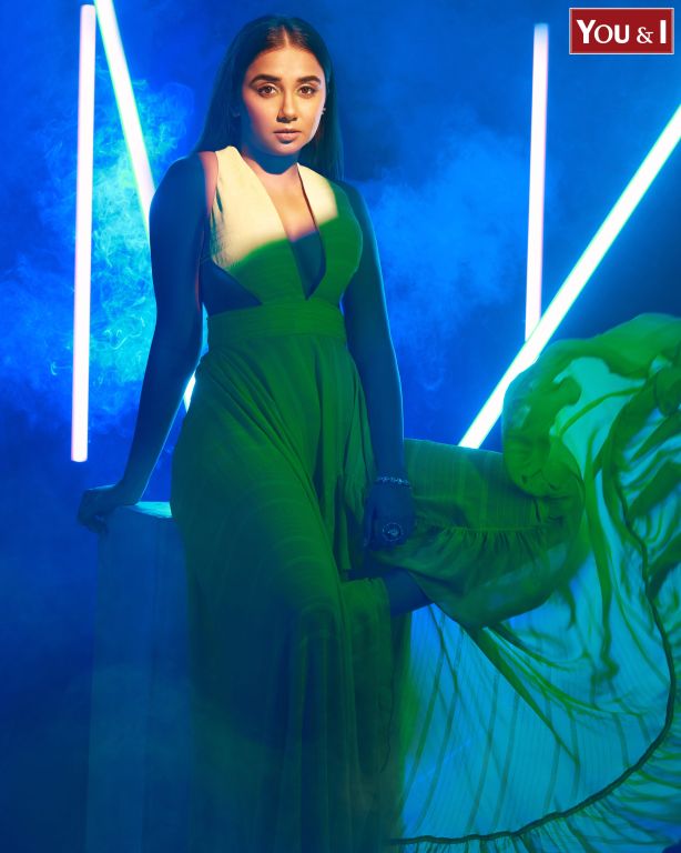 Prajackta Koli in our Lime Green Asymmetrical Ruffle Dress with Side Cutout detailing and Hand Embroidered Tassels from Magical Wilderness Collection