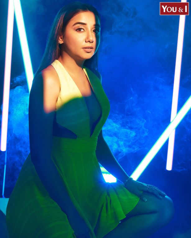 Prajackta Koli in our Lime Green Asymmetrical Ruffle Dress with Side Cutout detailing and Hand Embroidered Tassels from Magical Wilderness Collection