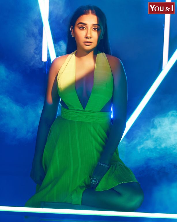 Prajackta Koli in our Lime Green Asymmetrical Ruffle Dress with Side Cutout detailing and Hand Embroidered Tassels from Magical Wilderness Collection