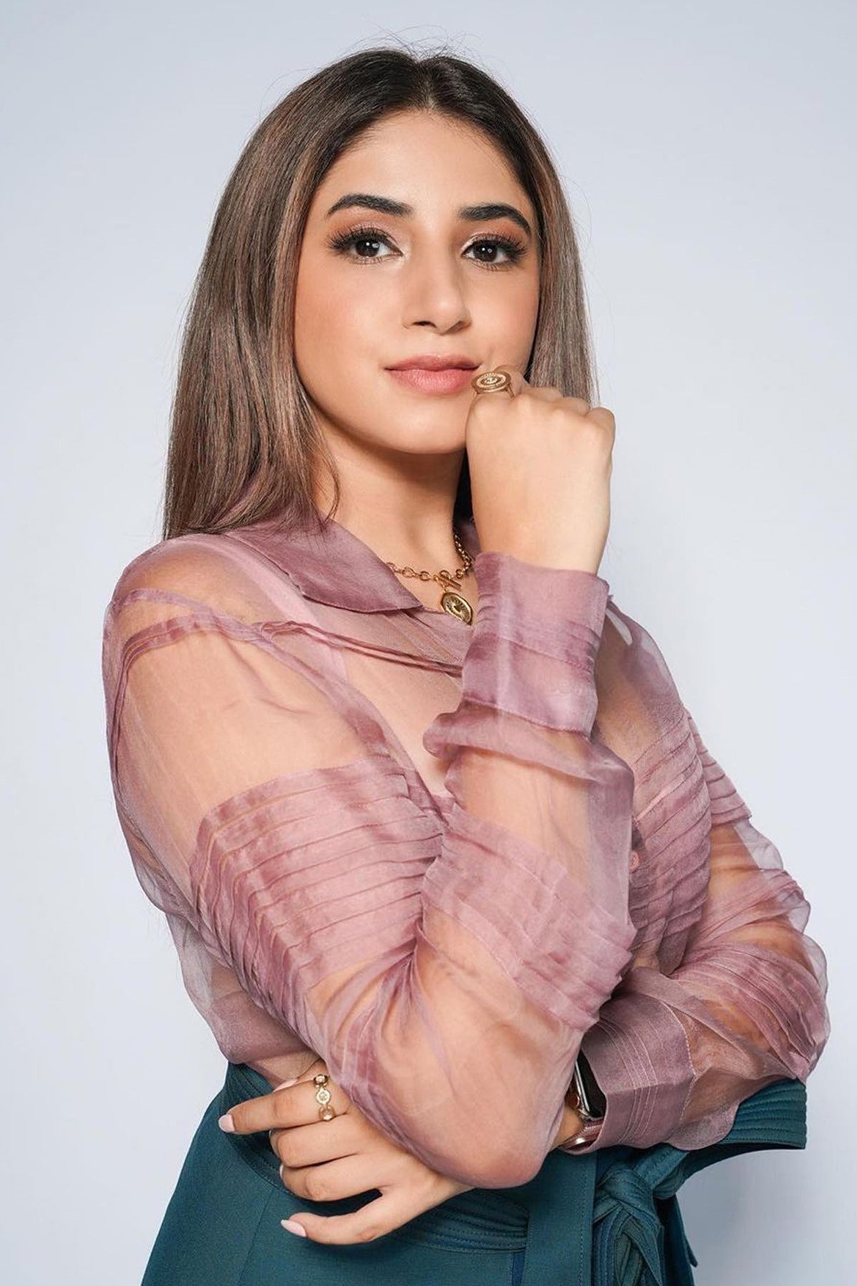 Aashna Shroff in Dusk Pink Pleated Shirt, Teal Georgette Cigarette Pants and Teal Origami