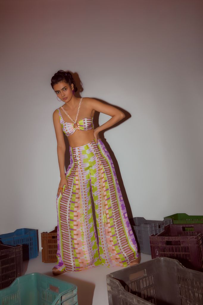 Geometric Printed Flared Pants with Rivet Detailing - Sale