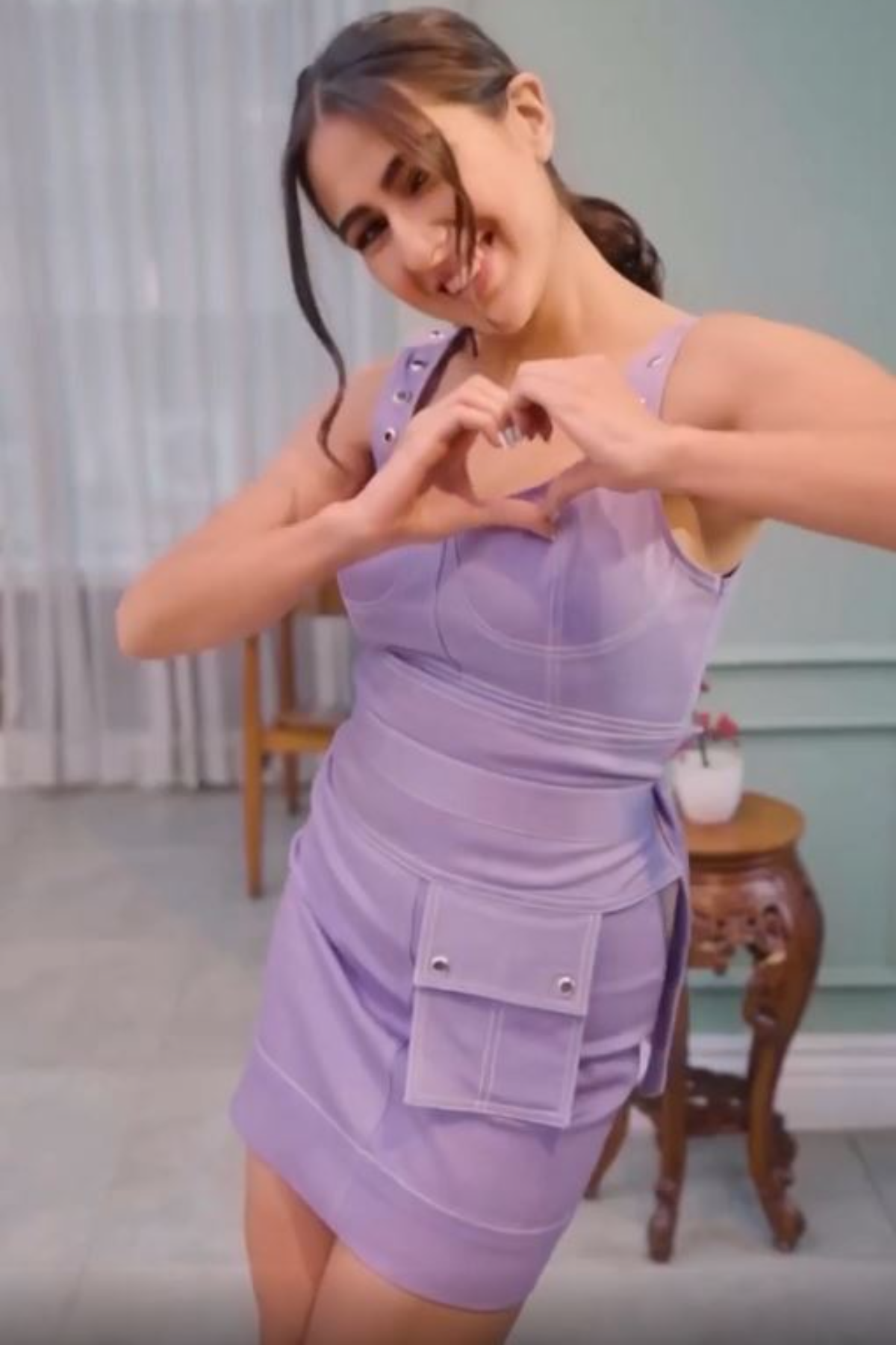 Sara Ali Khan In Lavender Bodycon with denim stitch detailing and Pocket Belt with Tie-Up