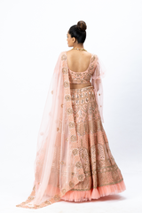 Dusty Pink Hand-embroidered Lehenga paired with Hand-embroidered Blouse with Elongated Sleeves and Hand-embroidered Dupatta with Buttis