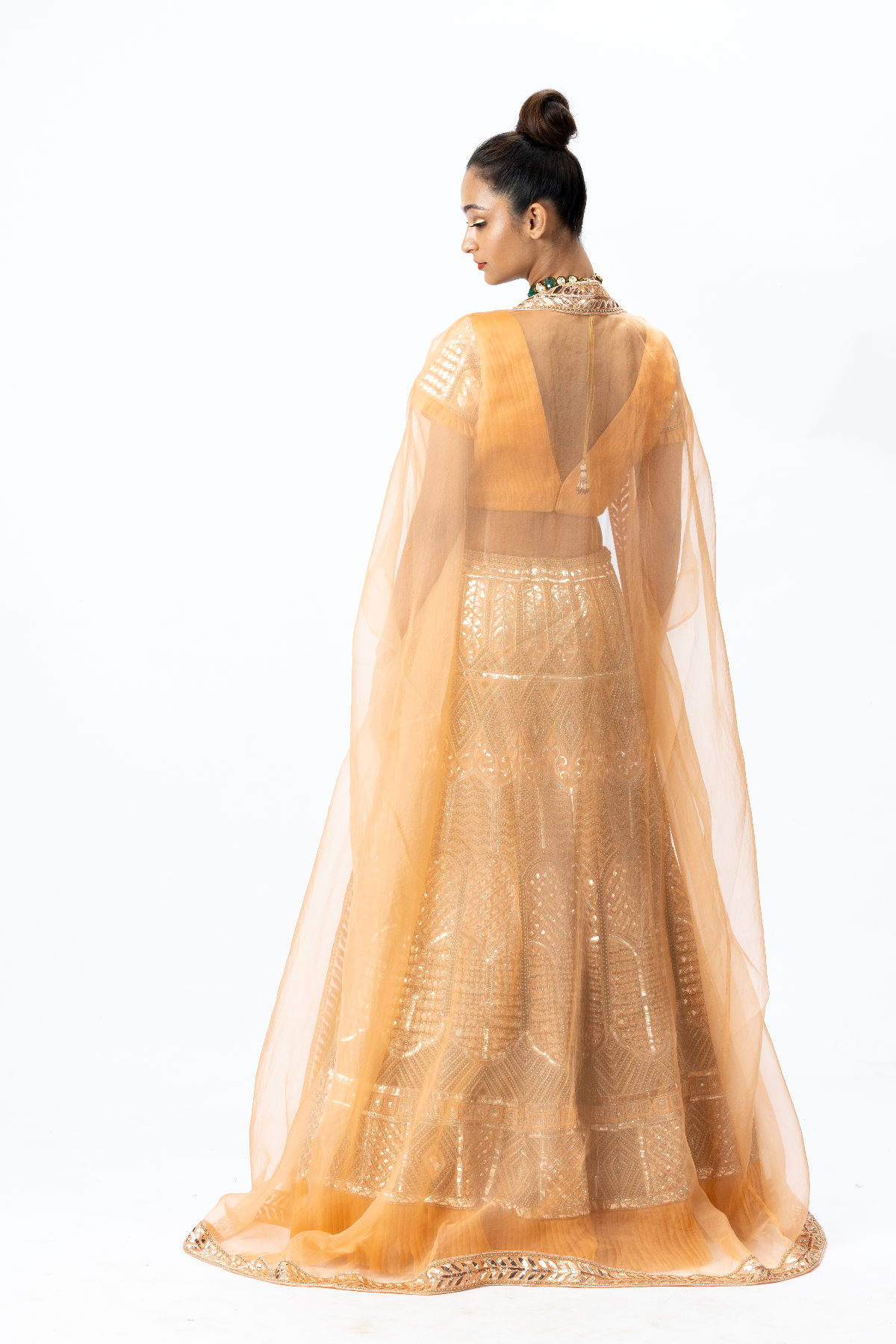 Orange Hand-embroidered Lehenga paired with Hand-embroidered Blouse and Cape with Hand-embroidered Border