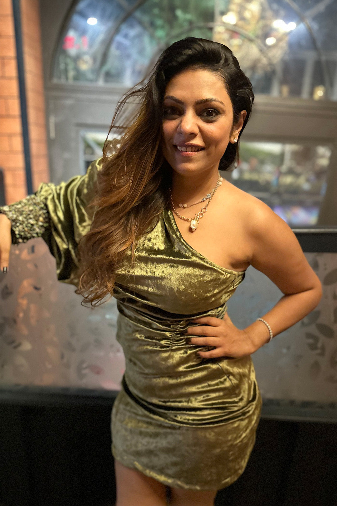 Nupur Survaia in our Green Drape Dress with embroidered cuff from Caged Kalidescope Collection