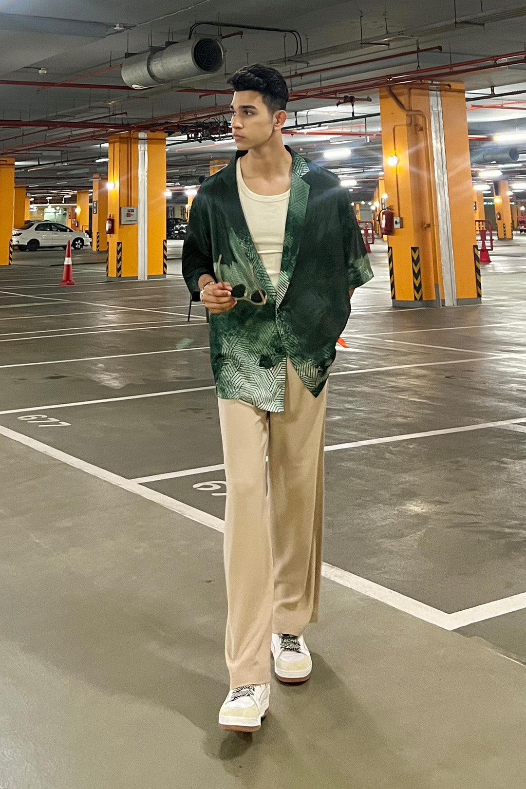 Jeet Tailor in our Emerald Green Bloched Print Haiwiian Shirt from Matrix Collection