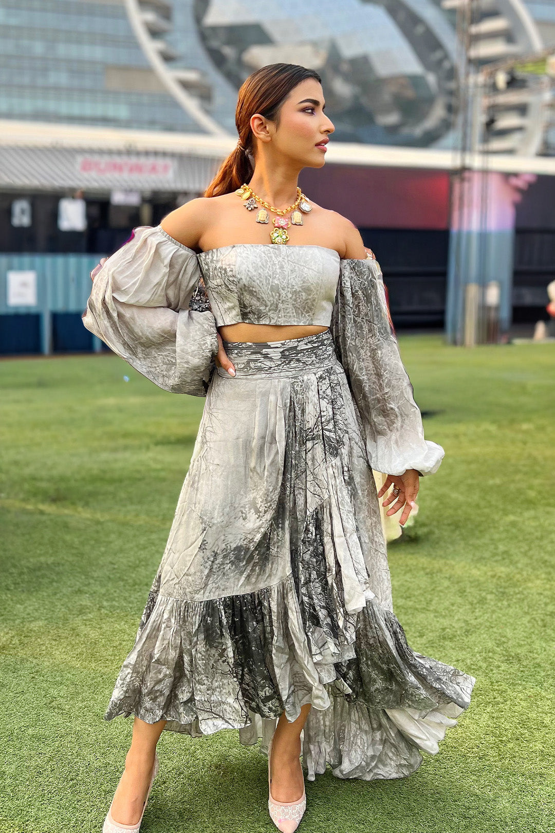 Kinjal Bhanushali in our Forest Printed Off-Shoulder Crop Top with Balloon Sleeves paired with Forest Printed Asymmetrical Skirt from Matrix Collection