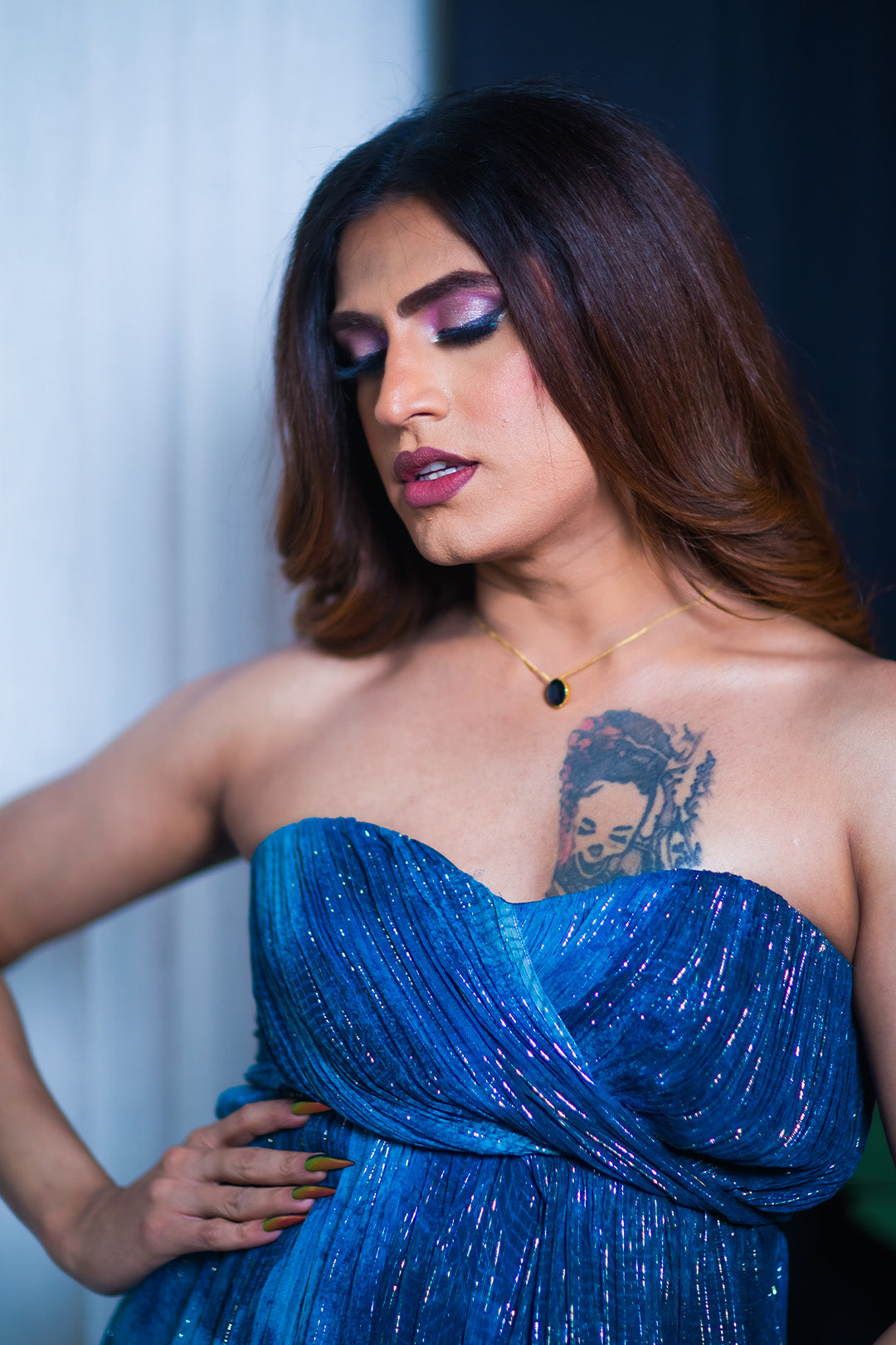 Shushant in our Jade Blue Printed Drape Gown With Sweet Heart Neck & Slit From Matrix Collection