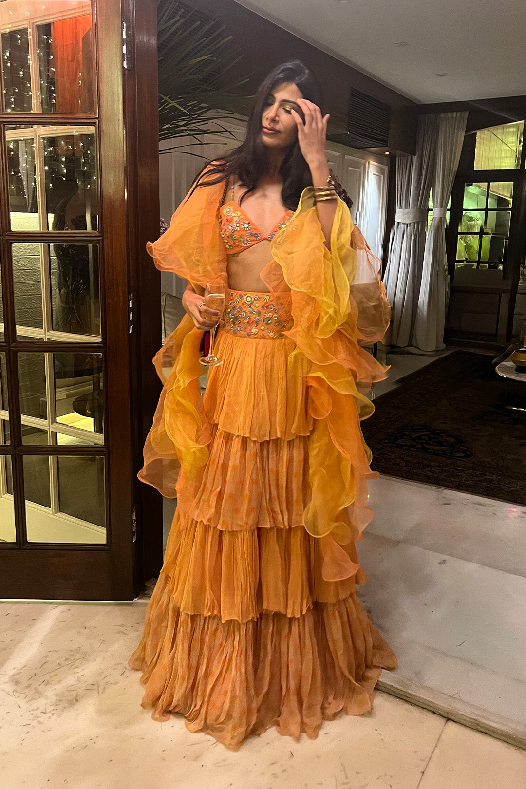 Astha Sharma in Our Orange Layered Lehenga Set from Retro-Spection Collection