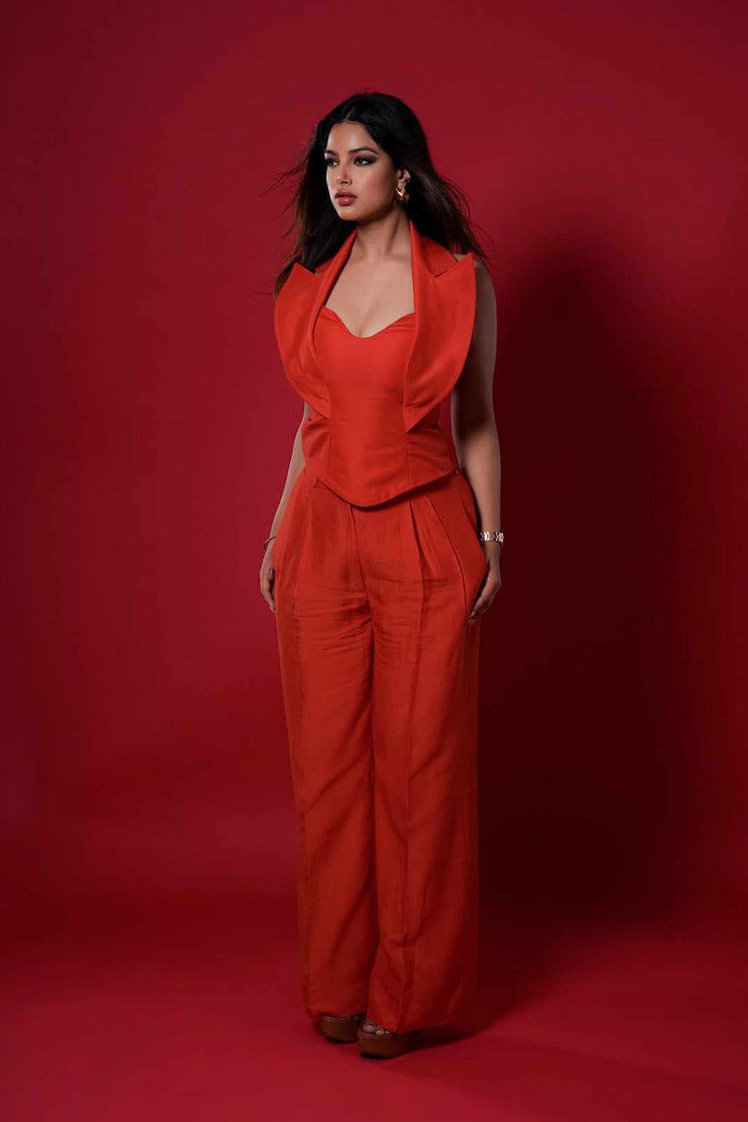 Harnaaz Sindhu in our Vermillion Halter Neck Corset Top with Lapel and Collar detailing Paired with Wide leg Pleated Pants from our Aham Asim Collection