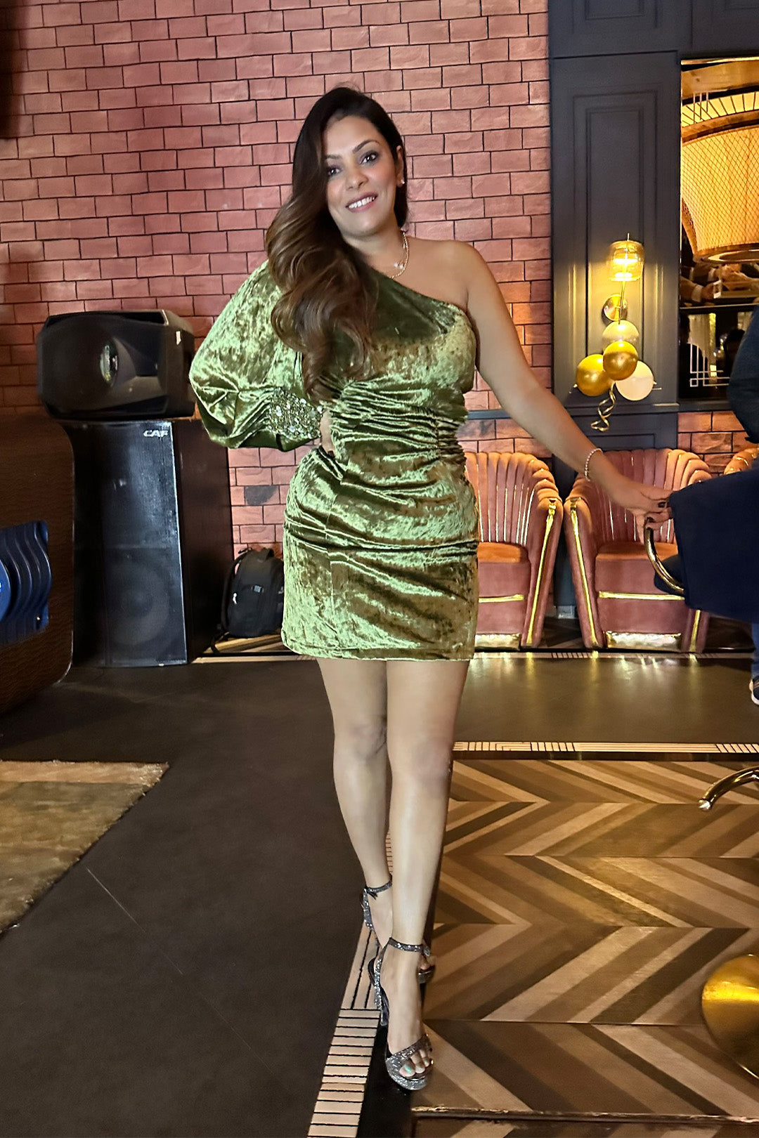 Nupur Survaia in our Green Drape Dress with embroidered cuff from Caged Kalidescope Collection