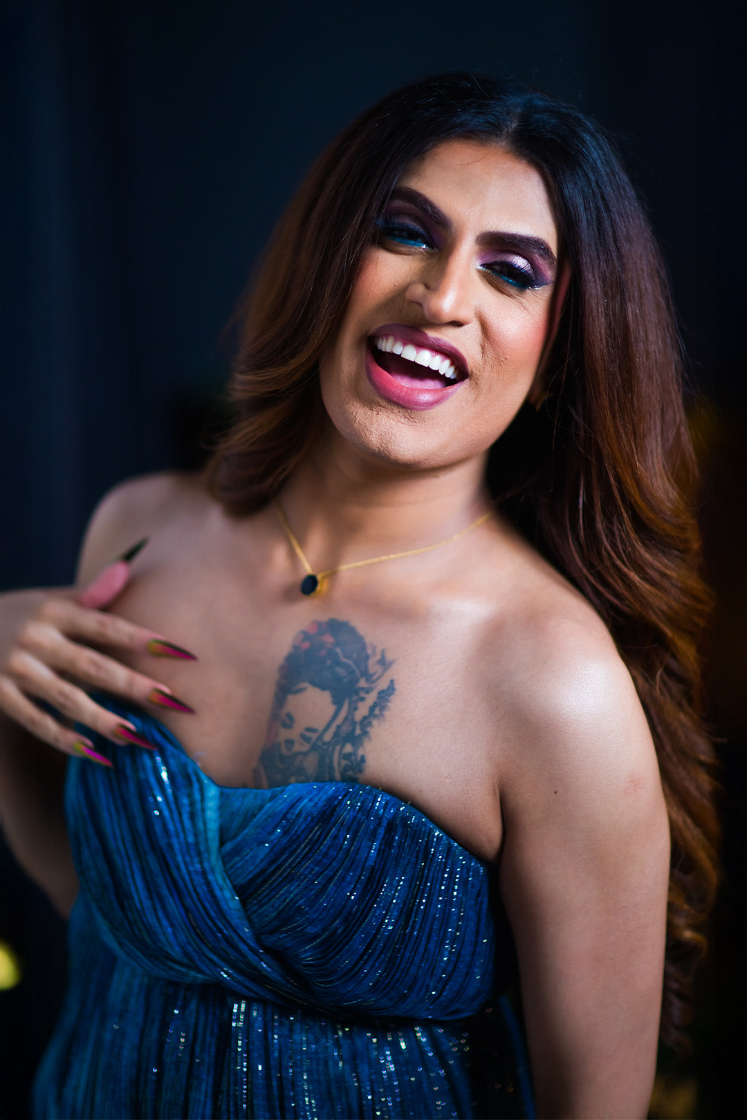 Shushant in our Jade Blue Printed Drape Gown With Sweet Heart Neck & Slit From Matrix Collection