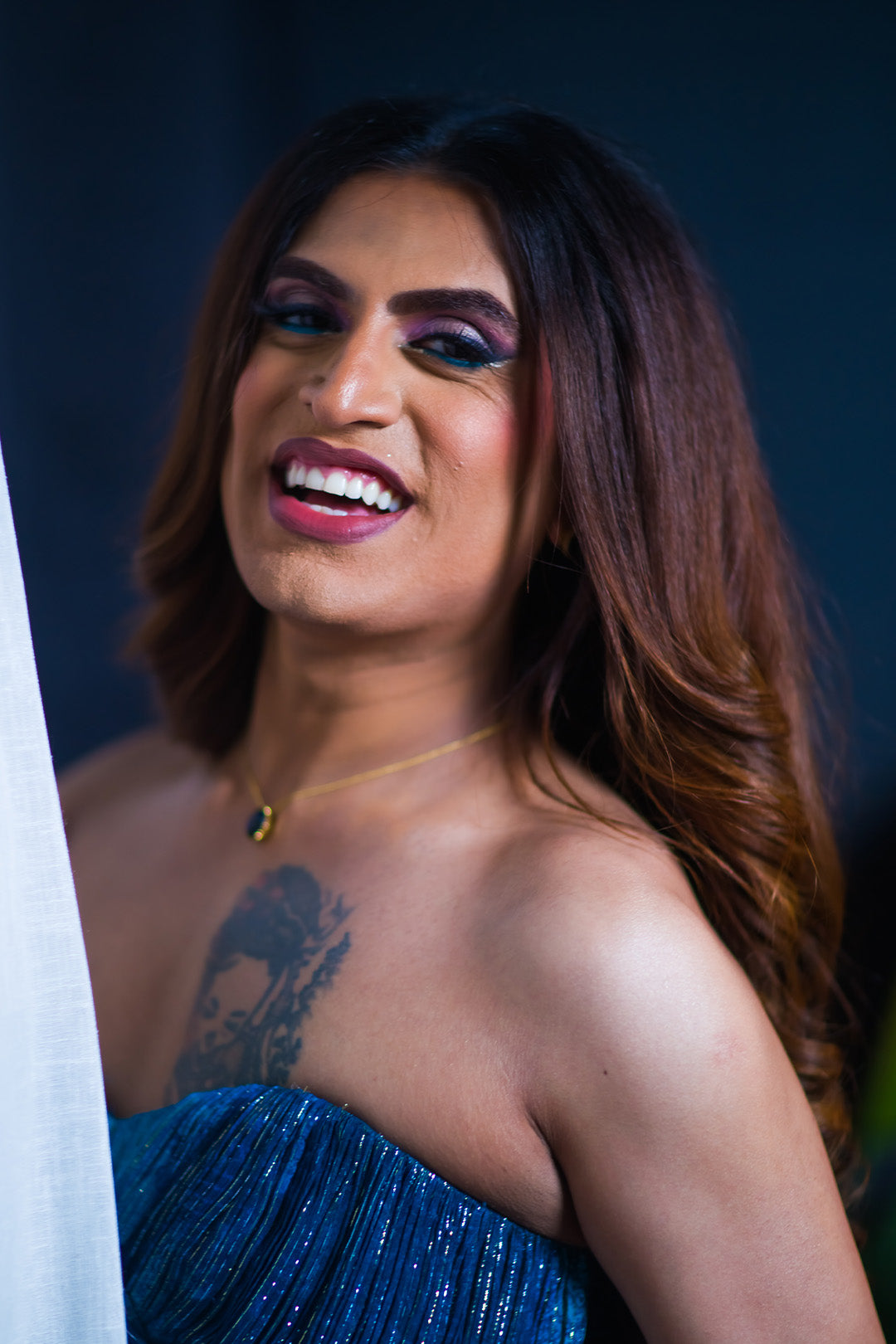 Shushant in our Jade Blue Printed Drape Gown With Sweet Heart Neck & Slit From Matrix Collection