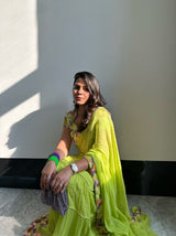 Chikky Goenka in Neon Hand Embroidered Blouse and Pre-Draped Saree with Cording detailing from Magical Wilderness Collection