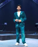 Armaan Malik in our Jade Blue Blotched Print Velvet Blazer with Detailing & Velvet Pants from Matrix