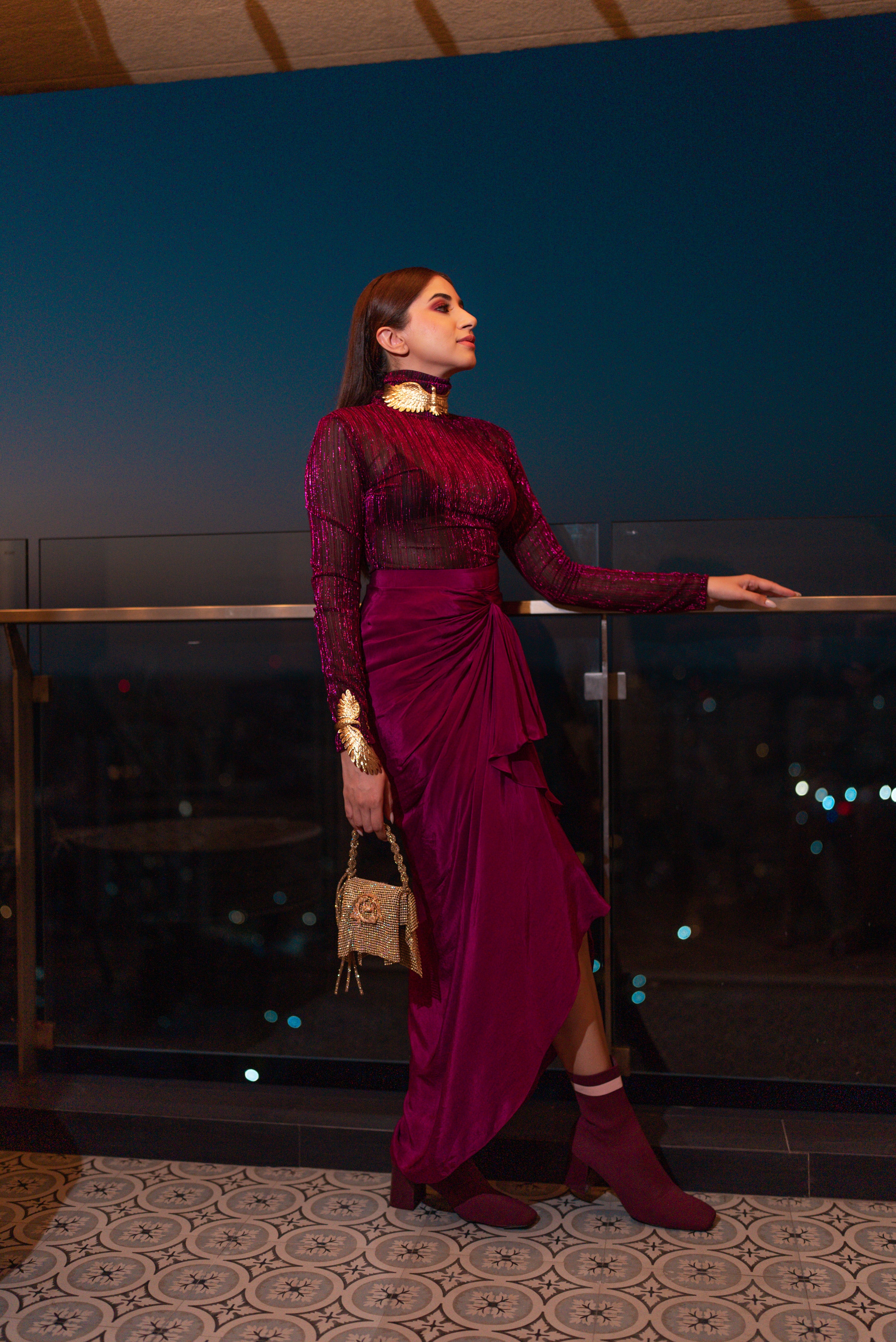 Aashna Shroff in Metalic Ruby Turtle Neck Monokini with Full Sleeves and Micro Bralette with Ruby Sarong Draped Skirt from Matrix Collection