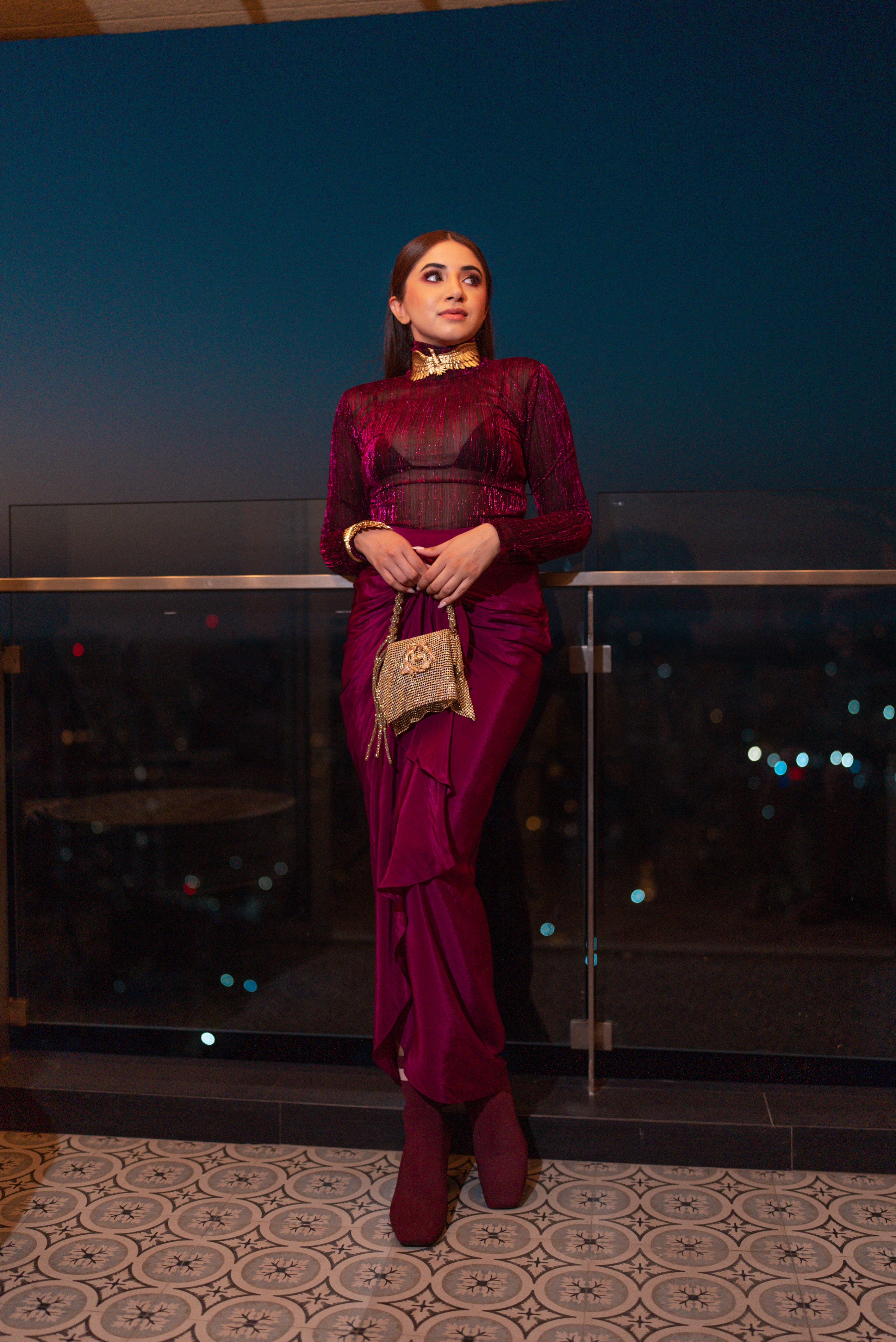 Aashna Shroff in Metalic Ruby Turtle Neck Monokini with Full Sleeves and Micro Bralette with Ruby Sarong Draped Skirt from Matrix Collection