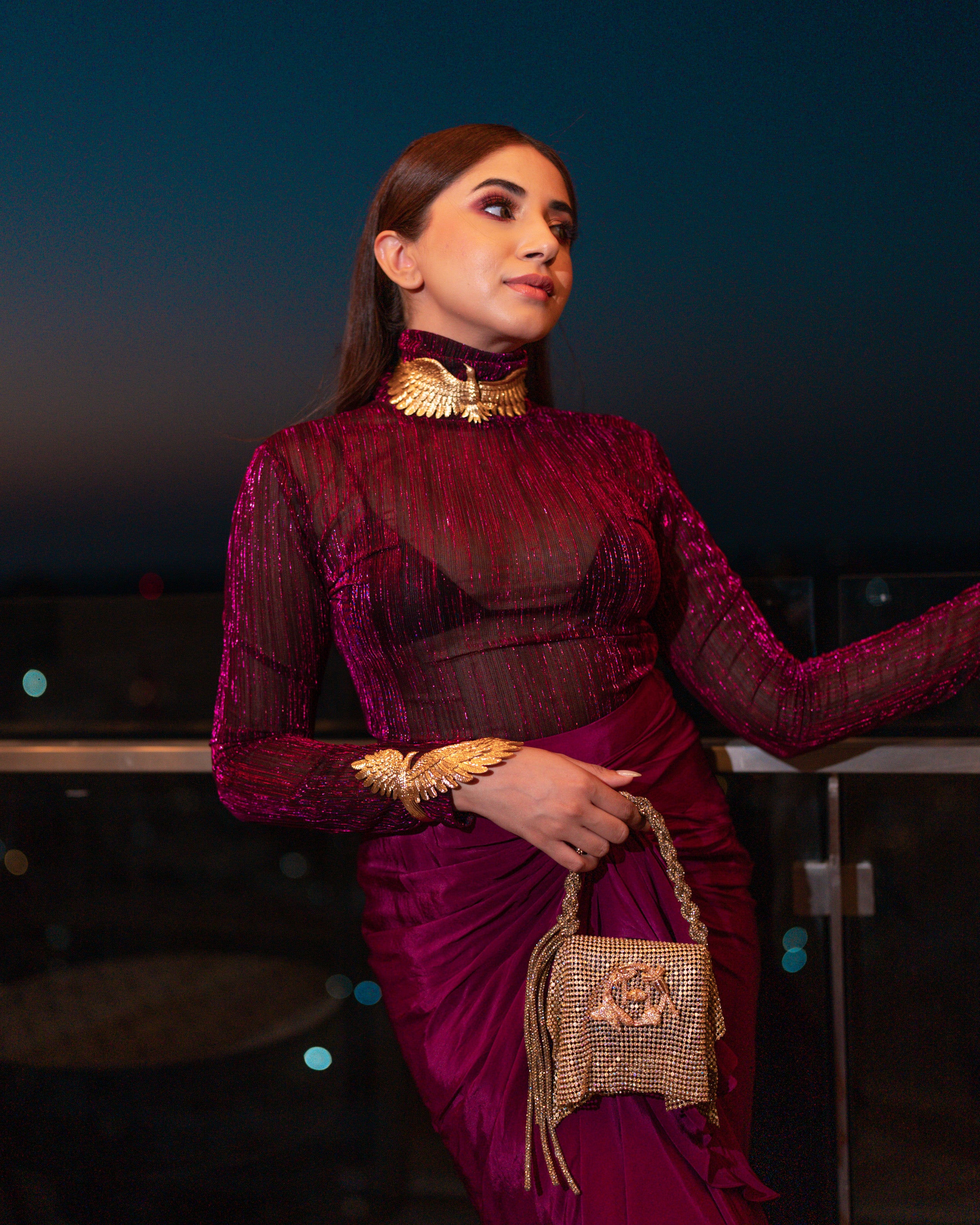 Aashna Shroff in Metalic Ruby Turtle Neck Monokini with Full Sleeves and Micro Bralette with Ruby Sarong Draped Skirt from Matrix Collection