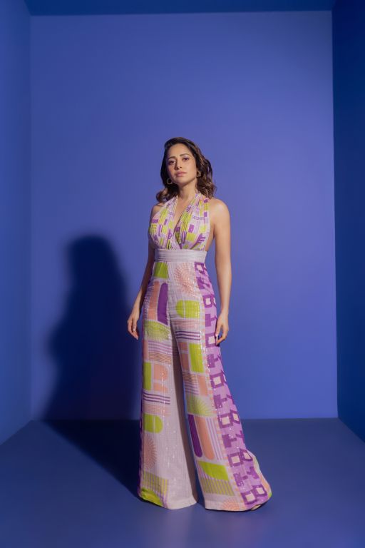Nushrat Bharuccha in our Geometric Printed Deep Halter Neck Tie up Jumpsuit from Magical Wilderness Collection