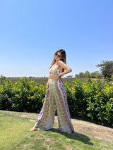 Deepika Ghose Geometric Printed Bralet with Hand Embroidered Straps and Center Ring detailing and Geometric Printed Flared Pants with Rivet Detailing from Magical Wilderness Collection