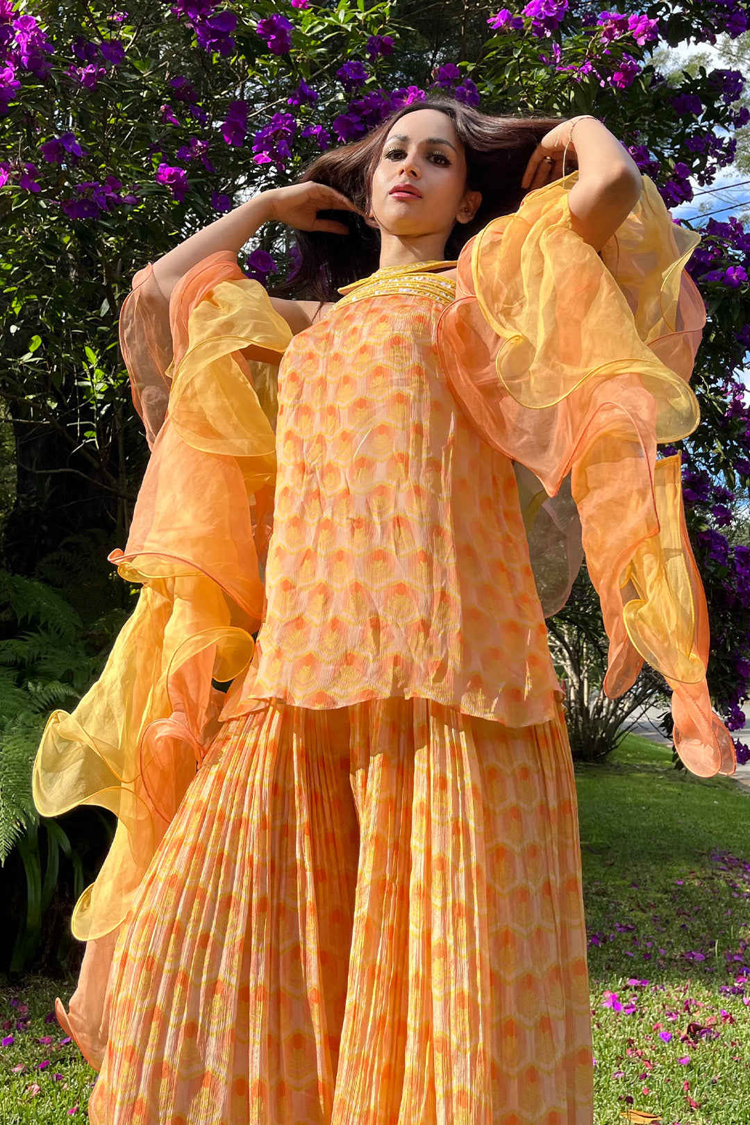 Sonali In our Hand-embroidered Printed Kurta, Printed Sharara with Double Layered Ruffled Dupatta from Retro- Spection Collection