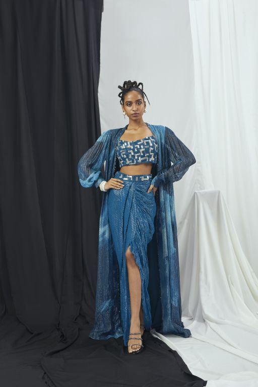 Jade Blue Hand Embroidered Bralet, Lurex Draped Dhoti Skirt and Printed Lurex Cape with Hand Embroidered Tassels