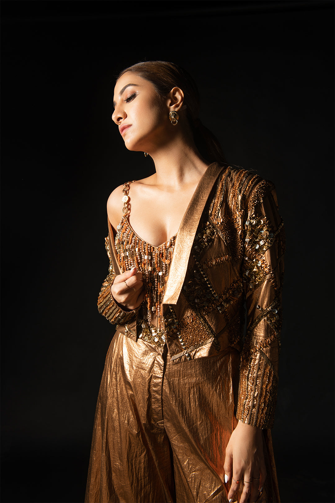 Rukmini Maitra in Hand Embroidered Bronze Metallic Bralette, Bronze Metallic Short Jacket and Bronze Baggy Pants