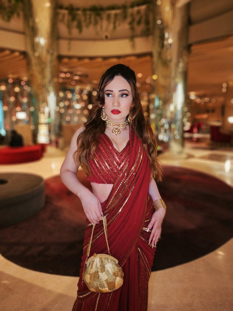 Stephanie Timmings in Red draped hand-embroidered sari with V-neck Blouse from our Caged Kaleidoscope Ethnic collection