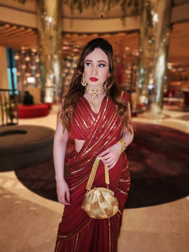 Stephanie Timmings in Red draped hand-embroidered sari with V-neck Blouse from our Caged Kaleidoscope Ethnic collection