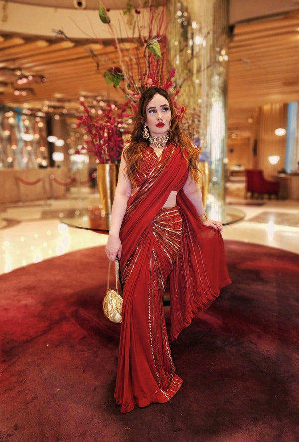 Stephanie Timmings in Red draped hand-embroidered sari with V-neck Blouse from our Caged Kaleidoscope Ethnic collection