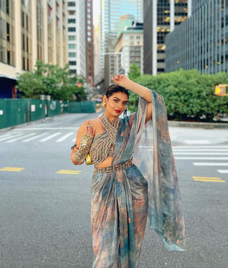 Rini Jain in Nirmooha's Halter Neck Hand-Embroidered Blouse with Cording detailing, Draped Chiffon Saree and Hand-Embroidered Belt  from Ancienne Collection