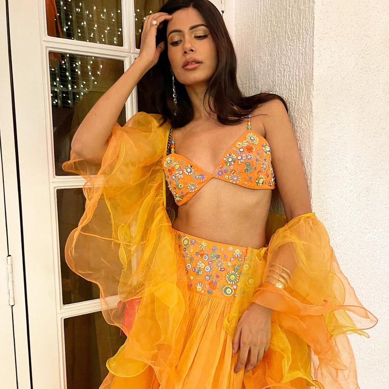Astha Sharma in Our Orange Layered Lehenga Set from Retro-Spection Collection