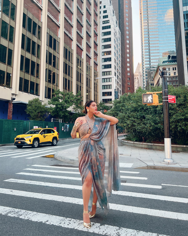 Rini Jain in Nirmooha's Halter Neck Hand-Embroidered Blouse with Cording detailing, Draped Chiffon Saree and Hand-Embroidered Belt  from Ancienne Collection