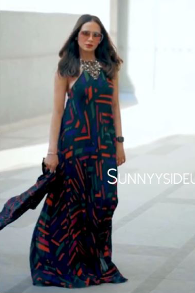 Priyanka (Sunny Side Up) in Nirmooha's Multicolored Hand-embroidered & Printed Maxi Gown.