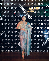Rini Jain in Nirmooha's Halter Neck Hand-Embroidered Blouse with Cording detailing, Draped Chiffon Saree and Hand-Embroidered Belt  from Ancienne Collection