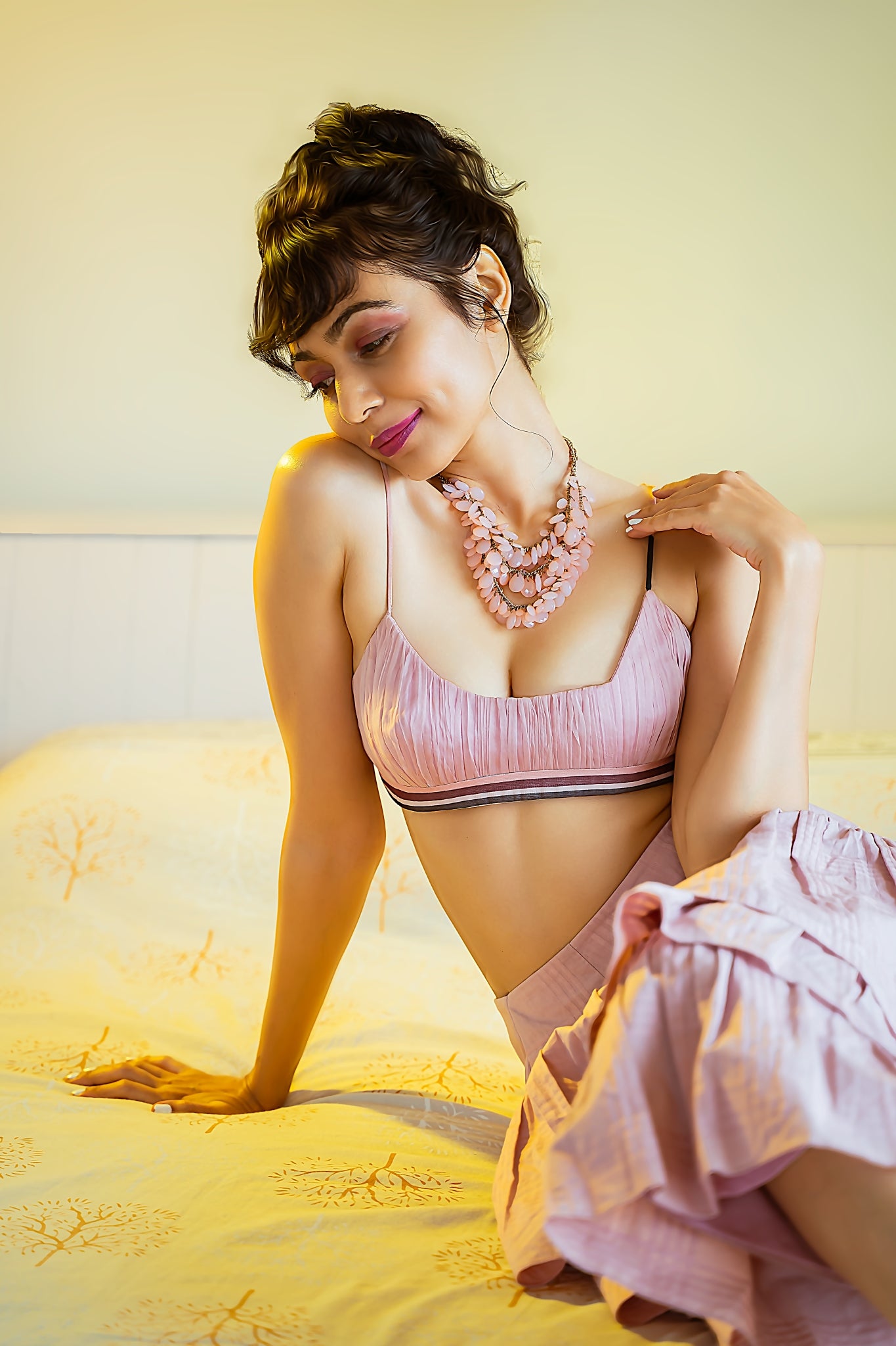 Meghana Kaushik in our Dust Pink Check Print Layered Cotton Flare Skirt with Organza Pleated Bralet with Printed Drawstring from Arruga Collection